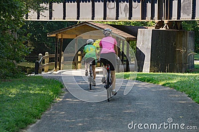 Two Cyclist on the Tinker Creek Greenway Editorial Stock Photo